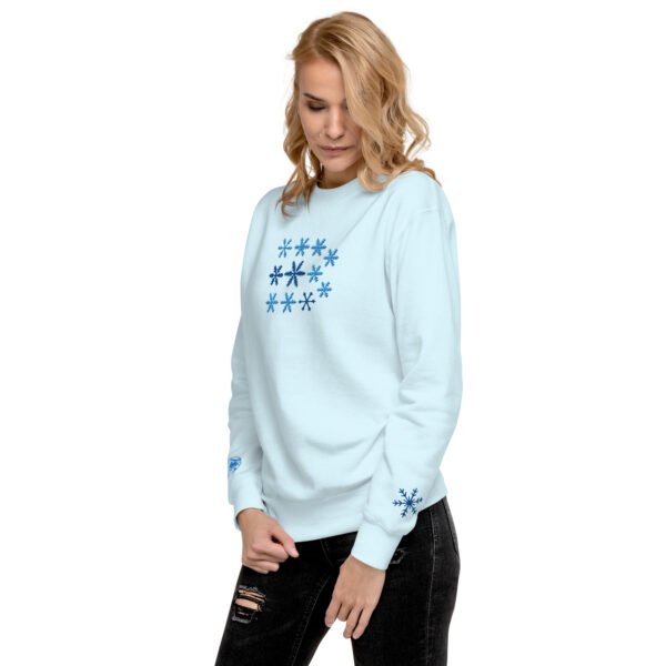 unisex-premium-sweatshirt-sky-blue-left-front-696796e0d4761.jpg Sudadera Orbayu Snowflakes celeste